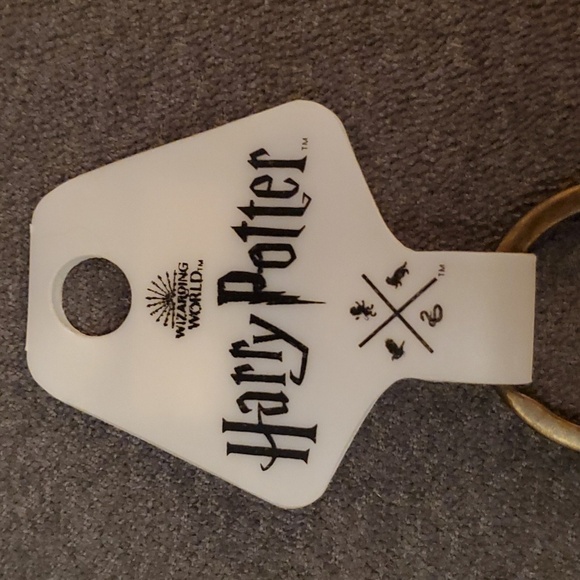 NWT Harry Potter metallic pivotal keychain. Four houses. From NYC store. - Picture 6 of 7